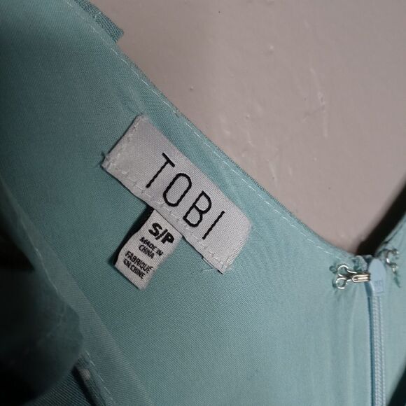 Tobi Floral Romper with Faux Wrap Skirt Side Tie - Picture 2 of 9